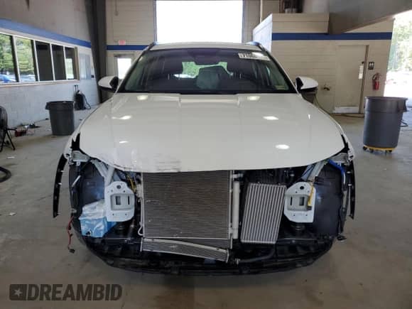 2024 Hyundai Tucson Blue with VIN KM8JBCD1XRU154834, listed as a Copart auction lot 71066995 with 13,974 mi miles and Salvage title. Bid and sale history available at DreamBid. Image 5.