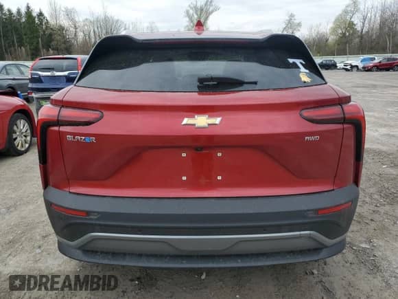 2024 Chevrolet Blazer EV eAWD LT z VIN 3GNKDBRJ7RS214565, wystawiony jako Copart lot #54657425 z przebiegiem 9 894 mil mil oraz Szkoda całkowita • Salvage title. Historia ofert i sprzedaży dostępna na DreamBid. Obrazek 6.