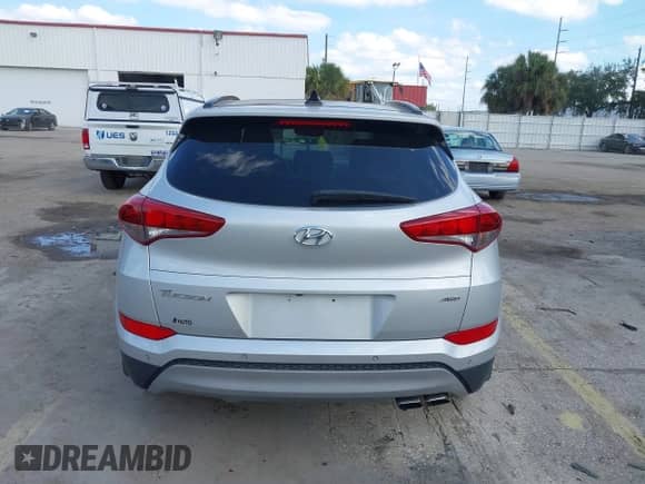 2018 Hyundai Tucson Value z VIN KM8J3CA22JU691468, wystawiony jako IAAI lot #43531295 z przebiegiem Nie podano mil oraz . Historia ofert i sprzedaży dostępna na DreamBid. Obrazek 15.