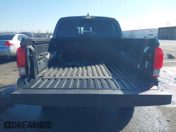 2017 Toyota Tacoma TRD Off Road with VIN 5TFAZ5CN2HX027623, listed as a IAAI auction lot 41731461 with 103,232 mi miles and . Bid and sale history available at DreamBid. Image 8.