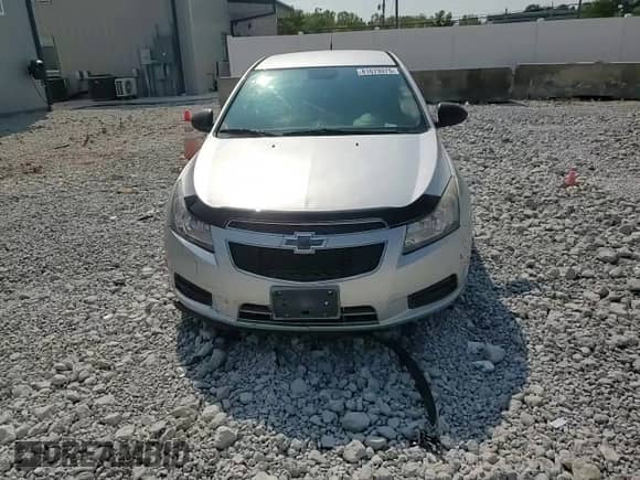 2014 Chevrolet Cruze LS z VIN 1G1PA5SH1E7234327, wystawiony jako Copart lot #81679075 z przebiegiem 99 834 mil mil oraz Szkoda całkowita • Salvage title. Historia ofert i sprzedaży dostępna na DreamBid. Obrazek 13.