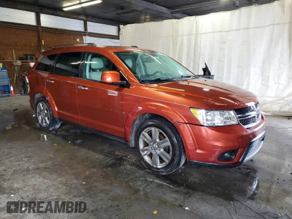 2012 Dodge Journey Crew with VIN 3C4PDDDG3CT224629, listed as a Copart auction lot 83854005 with 154,272 mi miles and Salvage title. Bid and sale history available at DreamBid. Image 4.