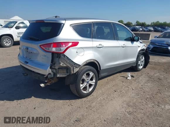 2014 Ford Escape SE with VIN 1FMCU0GX7EUA37725, listed as a IAAI auction lot 43318692 with 157,118 mi miles and . Bid and sale history available at DreamBid. Image 4.