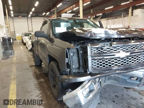 2014 Chevrolet Silverado 1500 Work Truck with VIN 1GCNCPEC7EZ269186, listed as a IAAI auction lot 40896337 with 127,410 mi miles and . Bid and sale history available at DreamBid. Image 18.