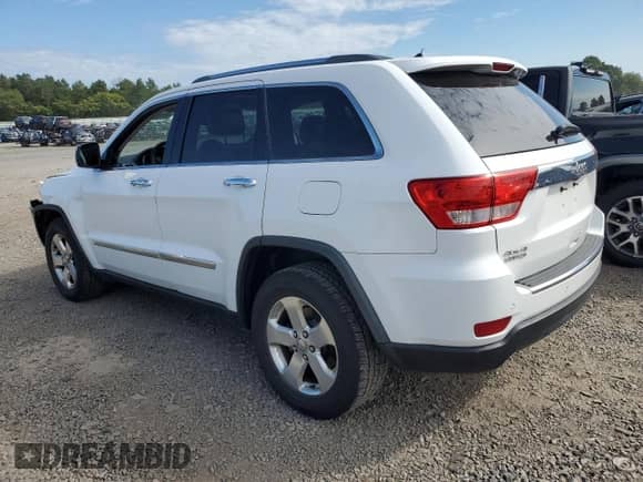2013 Jeep Grand Cherokee Limited with VIN 1C4RJFBG3DC510994, listed as a Copart auction lot 69953135 with 174,172 mi miles and Salvage title. Bid and sale history available at DreamBid. Image 2.