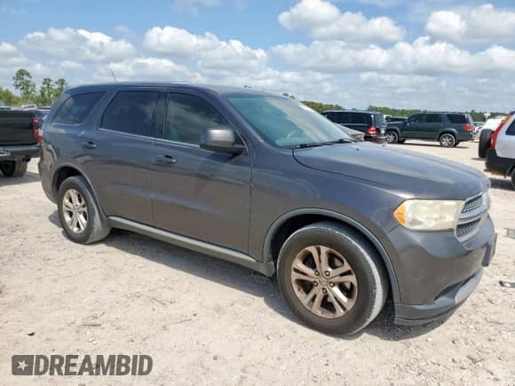 2013 Dodge Durango SXT with VIN 1C4RDHAG0DC692626, listed as a Copart auction lot 70991825 with 214,031 mi miles and Salvage title. Bid and sale history available at DreamBid. Image 4.