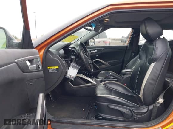 2013 Hyundai Veloster Turbo с VIN KMHTC6AE1DU128016, выставлен на аукционе IAAI как лот 42425892 с пробегом 104 209 миль миль и . История ставок и продаж доступна на DreamBid. Изображение 5.