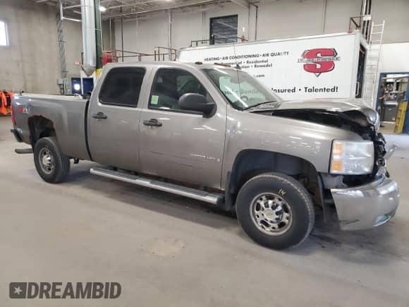 2007 Chevrolet Silverado 2500HD 1LT with VIN 1GCHK23K37F558650, listed as a Copart auction lot 55301575 with 304,437 mi miles and Salvage title. Bid and sale history available at DreamBid. Image 4.