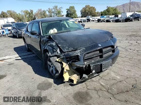 2009 Dodge Charger SE с VIN 2B3KA43D49H500443, выставлен на аукционе Copart как лот 82191155 с пробегом 168 293 миль миль и Списание • Salvage title. История ставок и продаж доступна на DreamBid. Изображение 13.