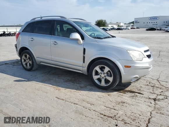 2014 Chevrolet Captiva Sport LT z VIN 3GNAL3EK2ES640550, wystawiony jako Copart lot #80170005 z przebiegiem 145 138 mil mil oraz Czysty tytuł • Clean title. Historia ofert i sprzedaży dostępna na DreamBid. Obrazek 4.