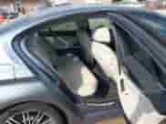 2019 BMW 5 Series 530e with VIN WBAJA9C55KB398579, listed as a IAAI auction lot 43238357 with 84,356 mi miles and . Bid and sale history available at DreamBid. Image 8.