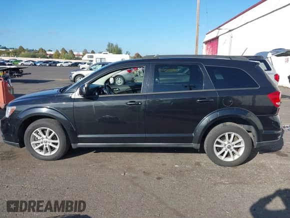2013 Dodge Journey SXT with VIN 3C4PDDBG8DT631897, listed as a IAAI auction lot 43308032 with 123,326 mi miles and . Bid and sale history available at DreamBid. Image 14.