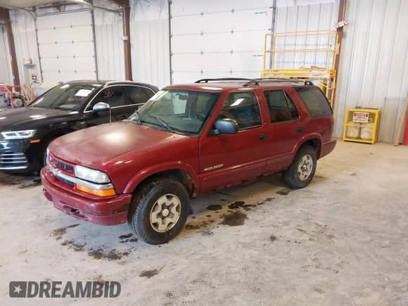 2003 Chevrolet Blazer LS с VIN 1GNDT13X03K175789, выставлен на аукционе IAAI как лот 42166503 с пробегом 302 661 миль миль и . История ставок и продаж доступна на DreamBid. Изображение 2.