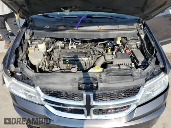 2016 Dodge Journey SE с VIN 3C4PDCAB8GT211934, выставлен на аукционе Copart как лот 59884175 с пробегом 82 431 миль миль и Списание • Salvage title. История ставок и продаж доступна на DreamBid. Изображение 12.