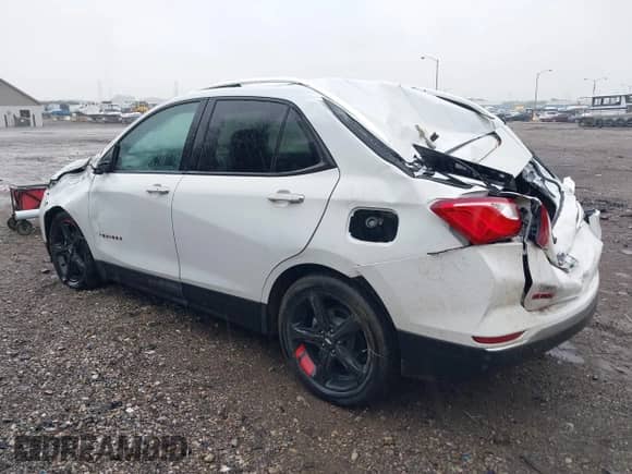 2021 Chevrolet Equinox Premier with VIN 2GNAXNEV0M6128650, listed as a IAAI auction lot 42361738 with 21,246 mi miles and . Bid and sale history available at DreamBid. Image 3.