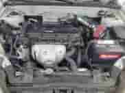 2006 Hyundai Tiburon GS z VIN KMHHM65D06U205823, wystawiony jako Copart lot #87125445 z przebiegiem 158 410 mil mil oraz Czysty tytuł • Clean title. Historia ofert i sprzedaży dostępna na DreamBid. Obrazek 11.