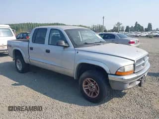 2004 Dodge Dakota SLT with VIN 1D7HG48N14S510024, listed as a IAAI auction lot 43156178 with 148,700 mi miles and . Bid and sale history available at DreamBid. Image 1.