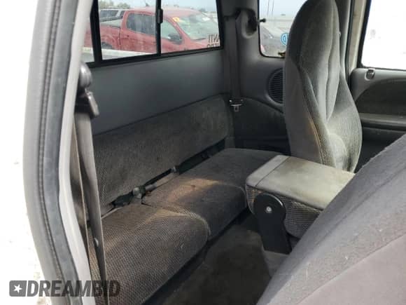 1999 Dodge Dakota SLT z VIN 1B7GG22Y3XS111438, wystawiony jako Copart lot #64146875 z przebiegiem 281 560 mil mil oraz Szkoda całkowita • Salvage title. Historia ofert i sprzedaży dostępna na DreamBid. Obrazek 10.