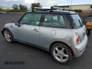 2002 MINI Hardtop with VIN WMWRC33422TC32681, listed as a Copart auction lot 52005995 with 110,228 mi miles and Salvage title. Bid and sale history available at DreamBid. Image 2.