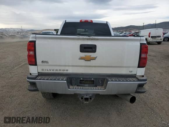2018 Chevrolet Silverado 2500HD LT with VIN 1GC1KVEY9JF237465, listed as a Copart auction lot 50810115 with 173,715 mi miles and Salvage title. Bid and sale history available at DreamBid. Image 6.