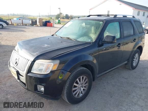 2010 Mercury Mariner Premier with VIN 4M2CN9HG3AKJ08715, listed as a IAAI auction lot 43390072 with 149,781 mi miles and . Bid and sale history available at DreamBid. Image 2.