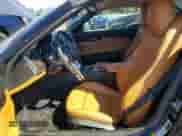 2011 BMW Z4 sDrive30i with VIN WBALM5C50BE380563, listed as a Copart auction lot 68116425 with 25,445 mi miles and Salvage title. Bid and sale history available at DreamBid. Image 7.