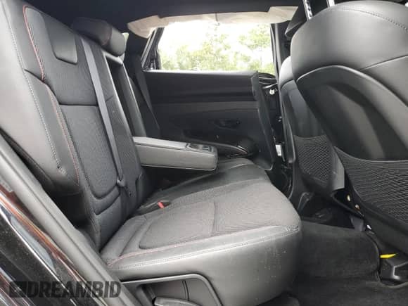 2022 Hyundai Tucson XRT z VIN KM8JF3AE5NU079367, wystawiony jako Copart lot #63818745 z przebiegiem Nie podano mil oraz Szkoda całkowita • Salvage title. Historia ofert i sprzedaży dostępna na DreamBid. Obrazek 11.