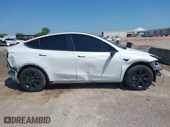 2023 Tesla Model Y Long Range z VIN 7SAYGDEE0PA178495, wystawiony jako IAAI lot #42507571 z przebiegiem 55 840 mil mil oraz . Historia ofert i sprzedaży dostępna na DreamBid. Obrazek 13.