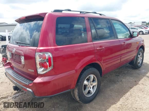2006 Honda Pilot EX-L with VIN 5FNYF18576B008419, listed as a IAAI auction lot 42930151 with 240,277 mi miles and . Bid and sale history available at DreamBid. Image 4.