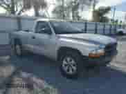 2003 Dodge Dakota с VIN 1D7FL16X23S122093, выставлен на аукционе Copart как лот 87394974 с пробегом 264 510 миль миль и Списание • Salvage title. История ставок и продаж доступна на DreamBid. Изображение 4.