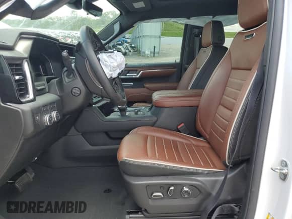 2024 GMC Sierra 1500 Denali Ultimate with VIN 1GTUUHE86RZ312786, listed as a Copart auction lot 59131065 with 20,998 mi miles and Salvage title. Bid and sale history available at DreamBid. Image 7.