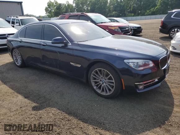 2015 BMW 7 Series 750Li xDrive with VIN WBAYF8C52FD654410, listed as a Copart auction lot 60043135 with 52,509 mi miles and Salvage title. Bid and sale history available at DreamBid. Image 4.
