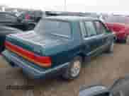 1993 Dodge Spirit with VIN 1B3XA46K5PF605264, listed as a IAAI auction lot 41561970 with 94,670 mi miles and . Bid and sale history available at DreamBid. Image 4.