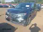 2016 Honda Pilot Touring with VIN 5FNYF6H9XGB120889, listed as a IAAI auction lot 43212929 with 129,095 mi miles and . Bid and sale history available at DreamBid. Image 6.