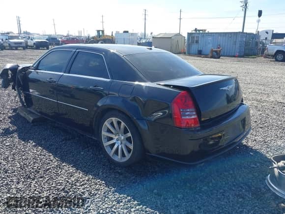 2006 Chrysler 300 C SRT-8 with VIN 2C3LA73W36H509656, listed as a IAAI auction lot 41852179 with 92,209 mi miles and . Bid and sale history available at DreamBid. Image 3.