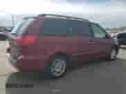 2010 Toyota Sienna XLE с VIN 5TDYK4CC1AS342159, выставлен на аукционе Copart как лот 84412115 с пробегом 214 042 миль миль и Списание • Salvage title. История ставок и продаж доступна на DreamBid. Изображение 3.