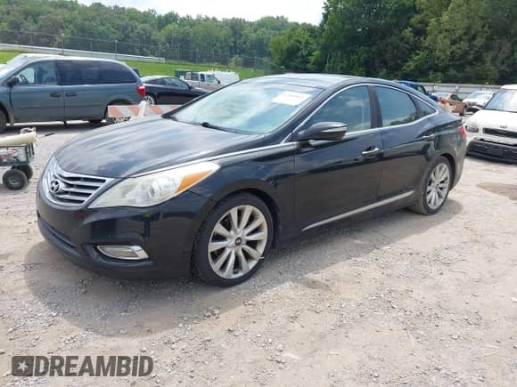 2014 Hyundai Azera Limited with VIN KMHFH4JG7EA362037, listed as a IAAI auction lot 42960064 with 216,970 mi miles and . Bid and sale history available at DreamBid. Image 2.