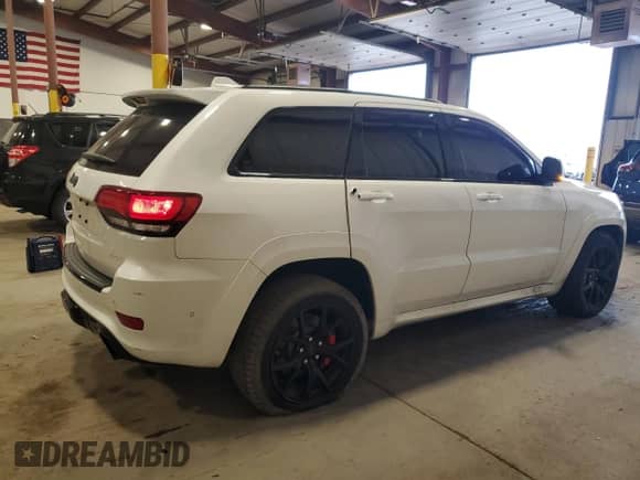 2020 Jeep Grand Cherokee SRT с VIN 1C4RJFDJ7LC413465, выставлен на аукционе Copart как лот 81673085 с пробегом 79 815 миль миль и Списание • Salvage title. История ставок и продаж доступна на DreamBid. Изображение 3.