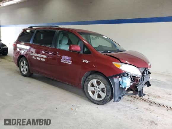 2017 Toyota Sienna LE with VIN 5TDKZ3DC3HS834096, listed as a Copart auction lot 84475525 with 184,632 mi miles and Clean title. Bid and sale history available at DreamBid. Image 4.