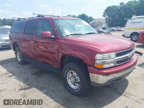 2004 Chevrolet Suburban LS z VIN 3GNGK26U94G291105, wystawiony jako IAAI lot #42476794 z przebiegiem 167 658 mil mil oraz . Historia ofert i sprzedaży dostępna na DreamBid. Obrazek 1.