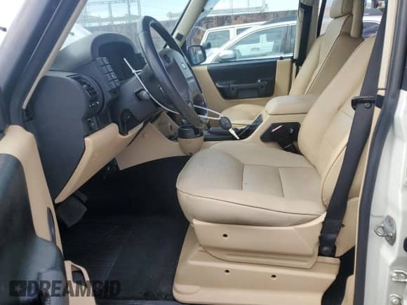 2004 Land Rover Discovery с VIN SALTL19494A840206, выставлен на аукционе Copart как лот 82645205 с пробегом 118 163 миль миль и Списание • Salvage title. История ставок и продаж доступна на DreamBid. Изображение 7.