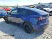 2023 Tesla Model Y Long Range with VIN 7SAYGDEEXPF749820, listed as a Copart auction lot 58756274 with 11,207 mi miles and Salvage title. Bid and sale history available at DreamBid. Image 2.