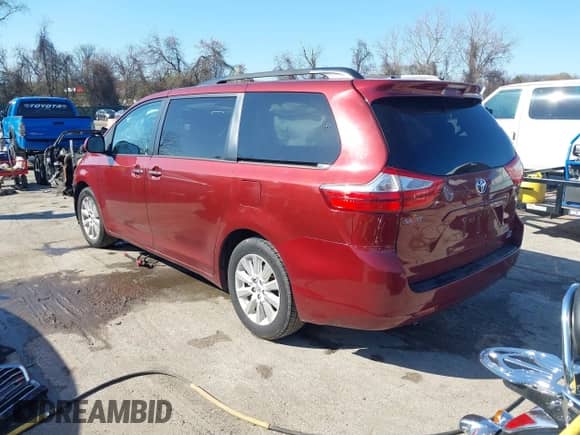 2015 Toyota Sienna Limited with VIN 5TDDK3DC0FS104012, listed as a IAAI auction lot 41935233 with 160,635 mi miles and . Bid and sale history available at DreamBid. Image 3.