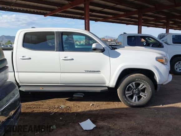 2019 Toyota Tacoma SR5 with VIN 3TMBZ5DN5KM017734, listed as a IAAI auction lot 43384246 with 54,886 mi miles and . Bid and sale history available at DreamBid. Image 13.