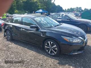 2016 Nissan Altima SV z VIN 1N4AL3AP1GC180869, wystawiony jako IAAI lot #42851561 z przebiegiem 28 945 mil mil oraz . Historia ofert i sprzedaży dostępna na DreamBid. Obrazek 1.