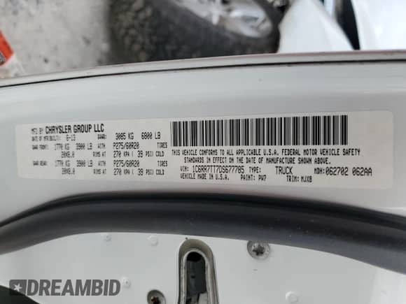 2013 Ram 1500 Lone Star with VIN 1C6RR7TT7DS677785, listed as a Copart auction lot 58735244 with 176,231 mi miles and Salvage title. Bid and sale history available at DreamBid. Image 12.