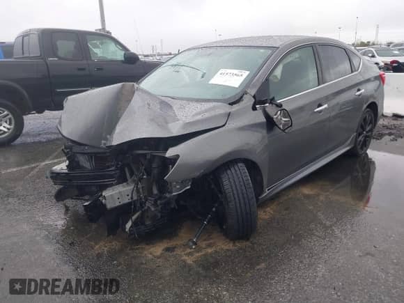 2017 Nissan Sentra SR z VIN 3N1AB7AP2HY240688, wystawiony jako IAAI lot #41573565 z przebiegiem 114 681 mil mil oraz . Historia ofert i sprzedaży dostępna na DreamBid. Obrazek 2.