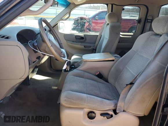 2001 Ford F-150 with VIN 2FTZX17291CA92218, listed as a Copart auction lot 46506195 with 150,331 mi miles and Salvage title. Bid and sale history available at DreamBid. Image 7.