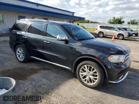 2015 Dodge Durango Citadel with VIN 1C4RDJEG0FC837779, listed as a Copart auction lot 71818565 with 242,177 mi miles and Clean title. Bid and sale history available at DreamBid. Image 4.
