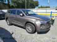 2019 Hyundai Santa Fe SE с VIN 5NMS2CAD0KH015154, выставлен на аукционе Copart как лот 81128065 с пробегом 99 341 миль миль и Списание • Salvage title. История ставок и продаж доступна на DreamBid. Изображение 4.